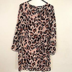 Long sleeved, pink leopard mini dress.
